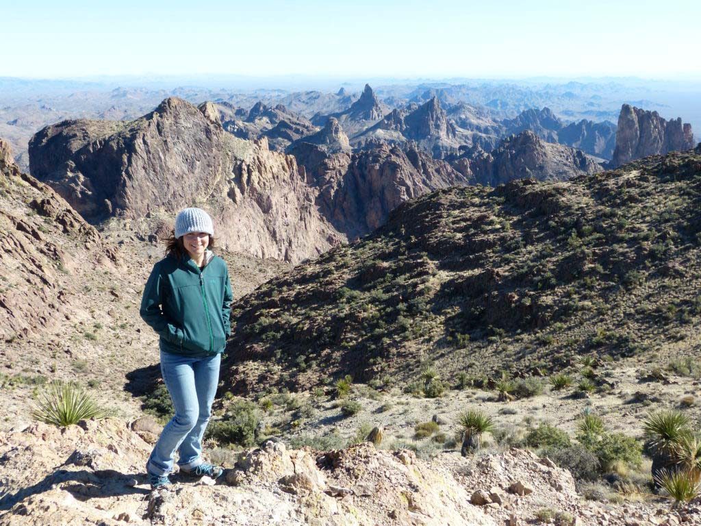 River K. Scott hiking among the mountains